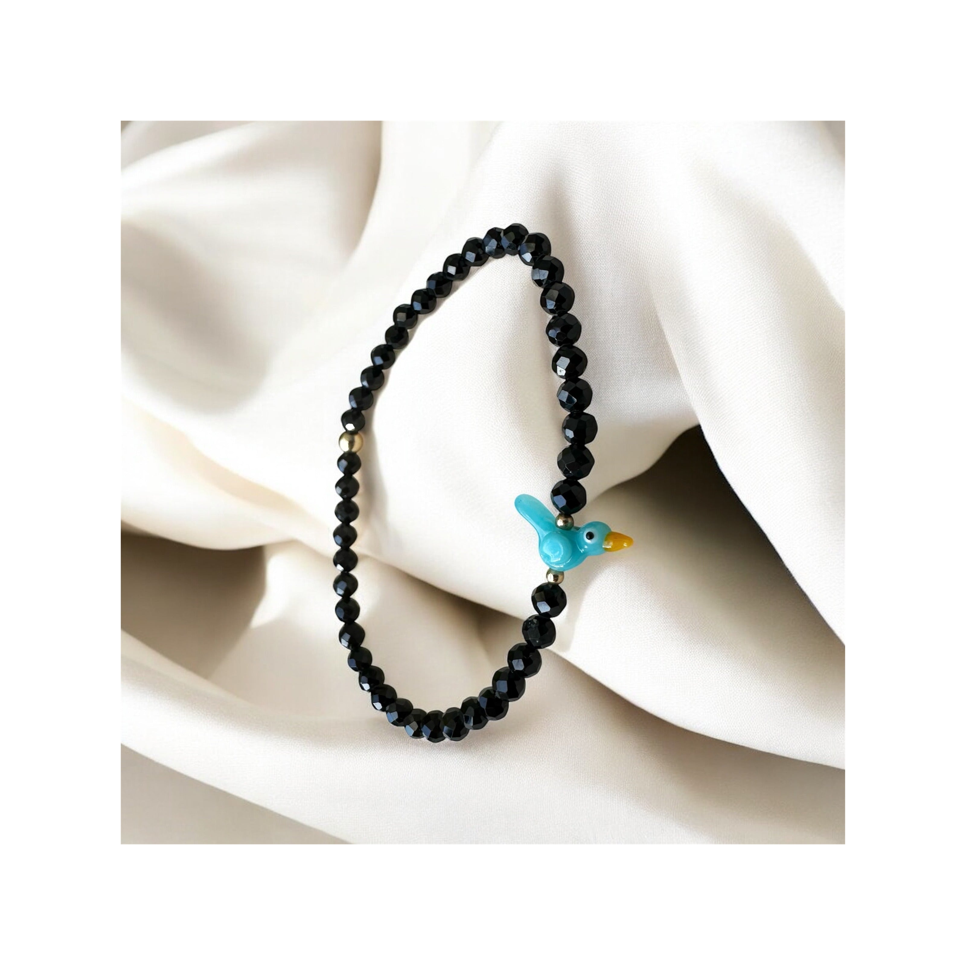 Aqua Sereno – Tiny Songbird of Still Waters