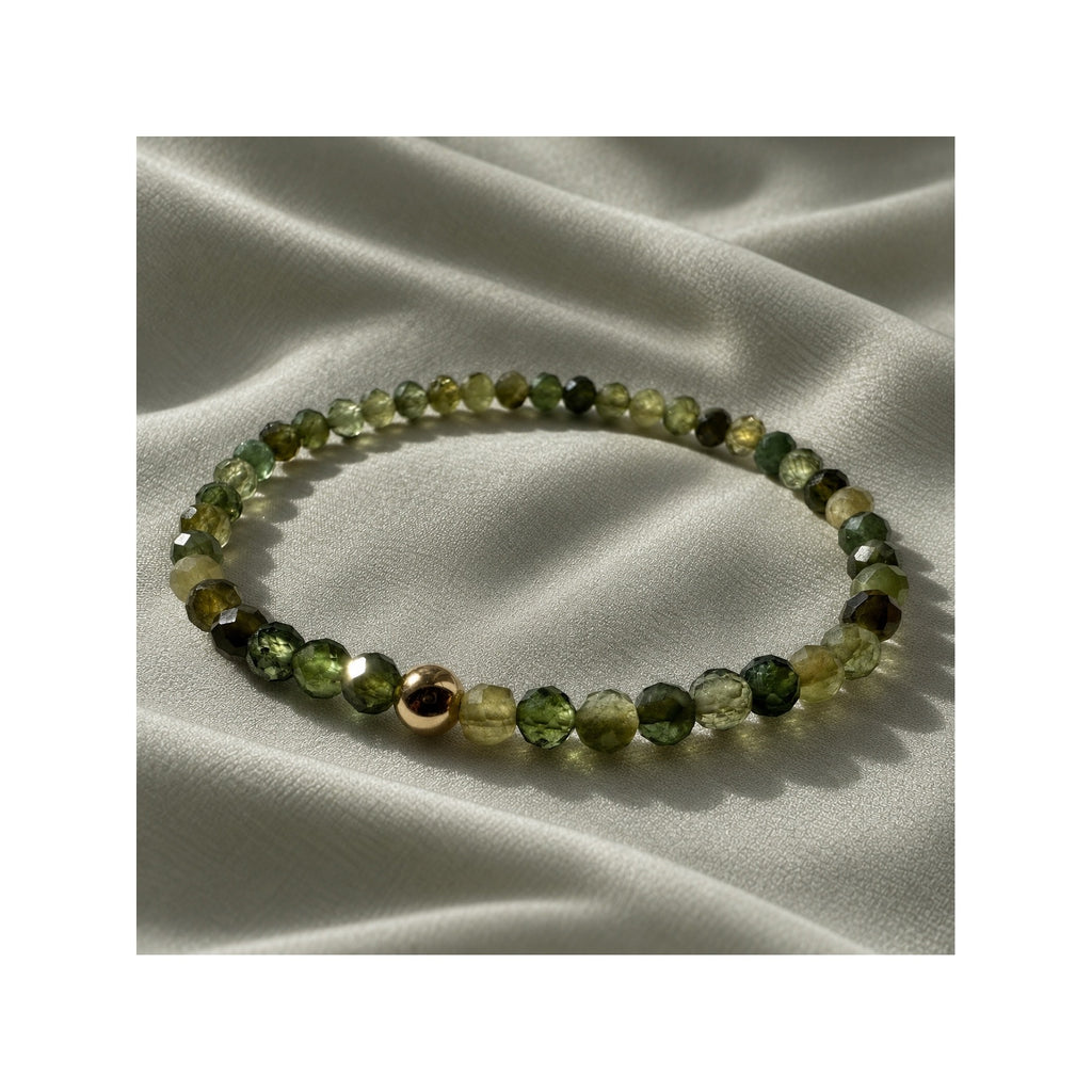 FOREST GREENS natural untreated AAA green tourmaline stretch bracelet with a solid 14k gold bead