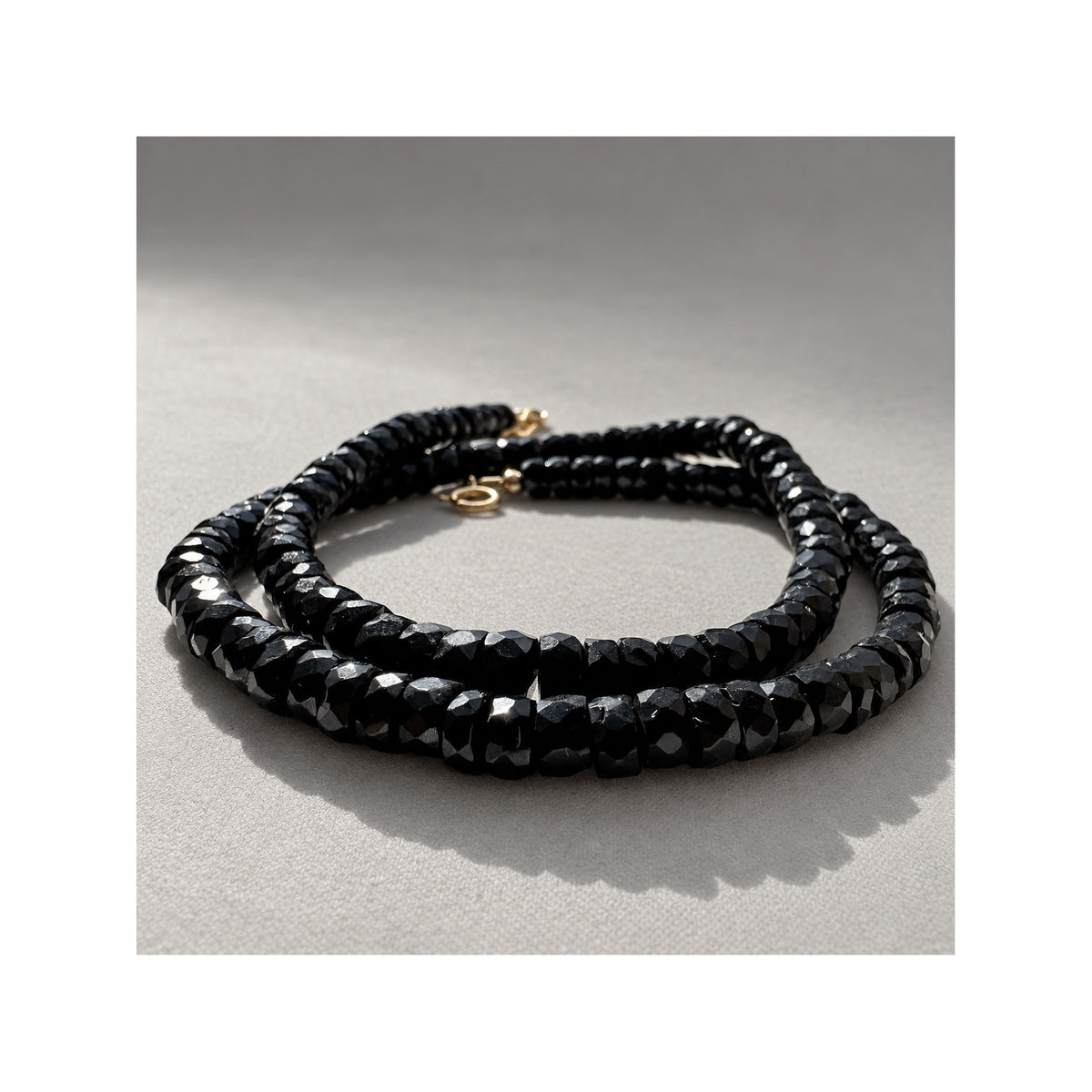 BLACK SERPENT necklace crafted with faceted black spinel gemstones from Thailand