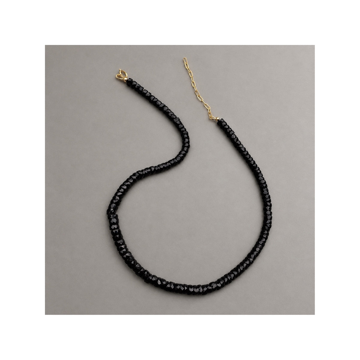 Natural untreated black spinel necklace, BLACK SERPENT collection by FLAME Atelier London